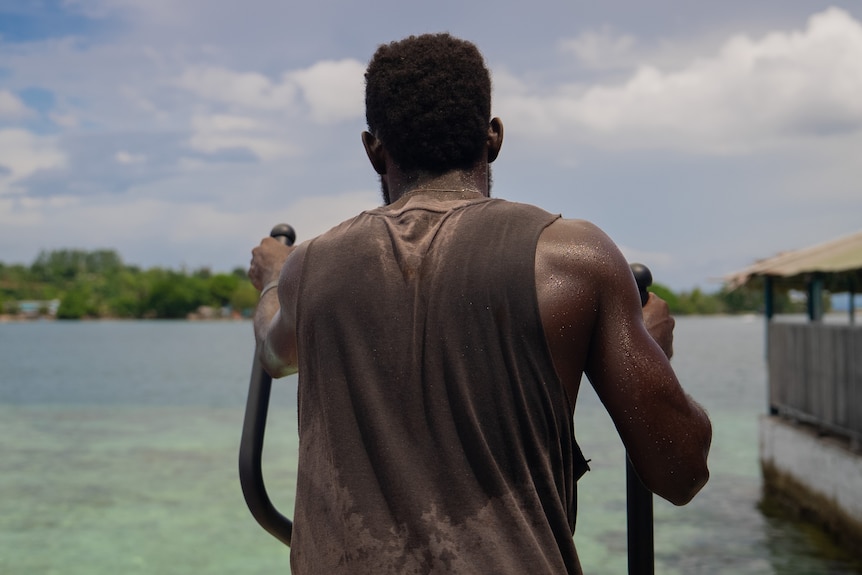A photo of a Bougainville rugby player's back.