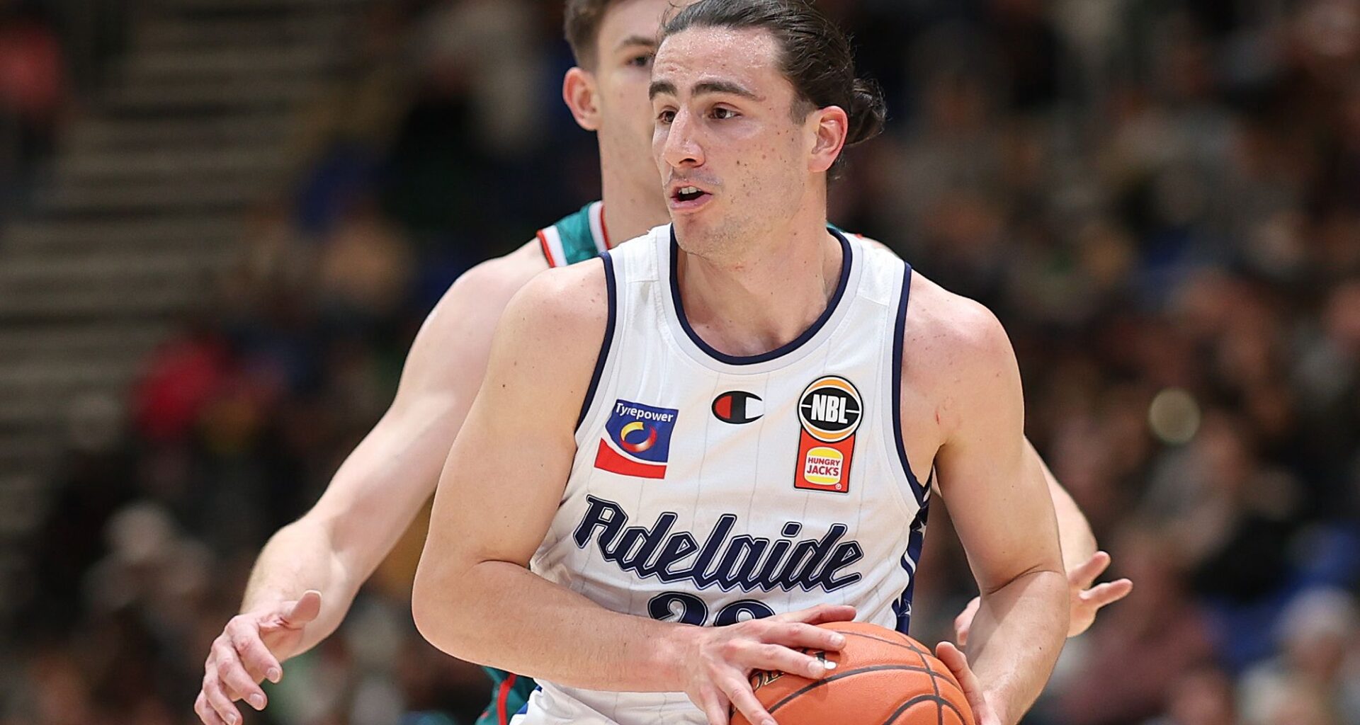 Sixers re-sign promising guard