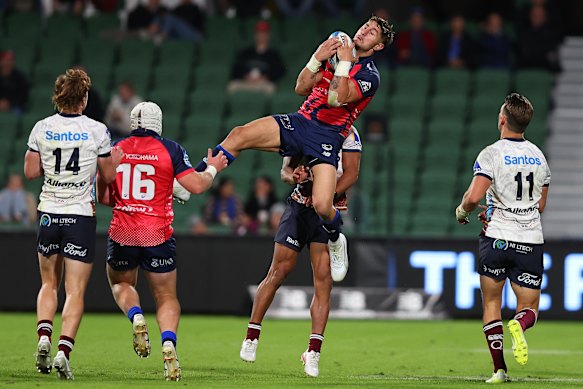 Zac Lomax of the Force catches the ball.