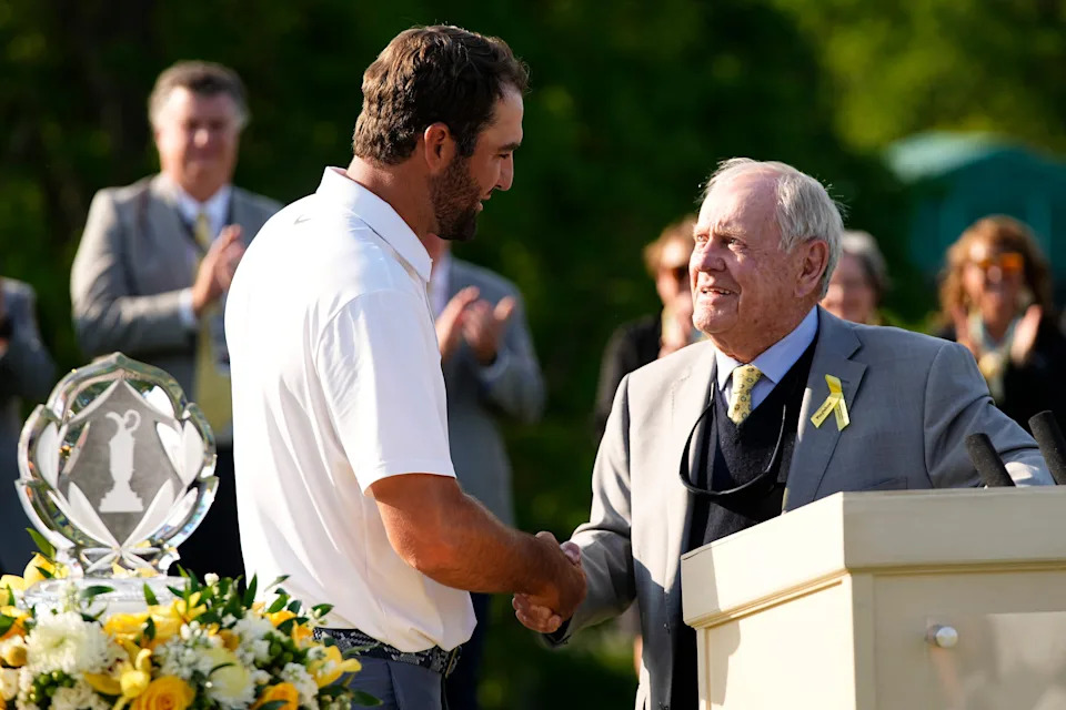 Scottie Scheffler shakes hands with Jack Nicklaus after winning the 2025 Memorial Tournament at Muirfield Village Golf Club.