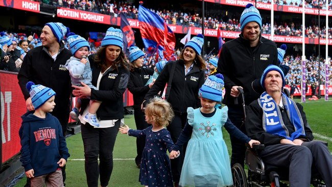 The Daniher family complete a lap of honour at the 2025 King’s Birthday clash.