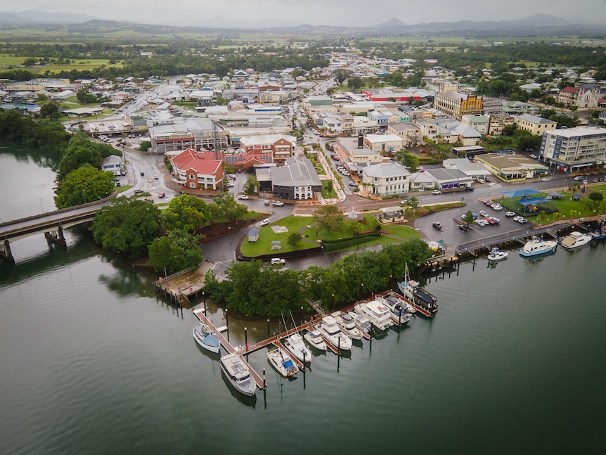 aerial picture of regional town situated next to river