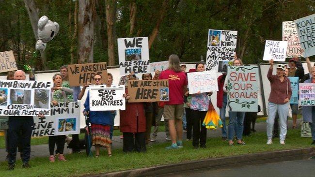Protesters lined the street outside the college. 