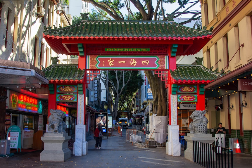 a traditional chinese gate in a city