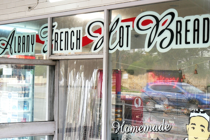 A medium shot of a shop front window