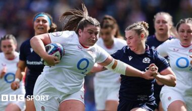 Maud Muir carries the ball