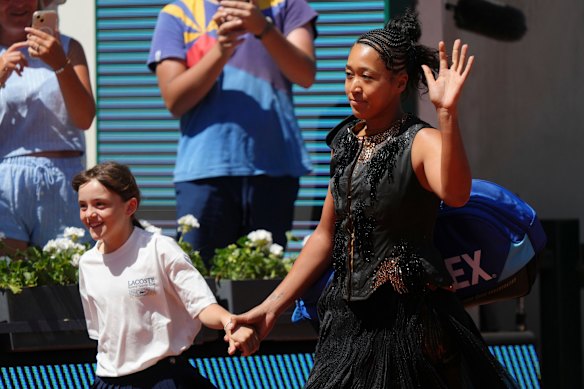 Naomi Osaka made another glamorous fashion entrance to a grand slam tournament, this time in Paris.