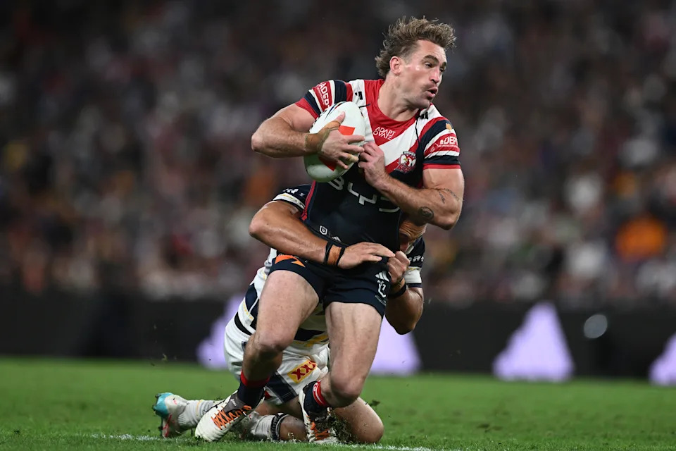 Connor Watson in action for the Roosters