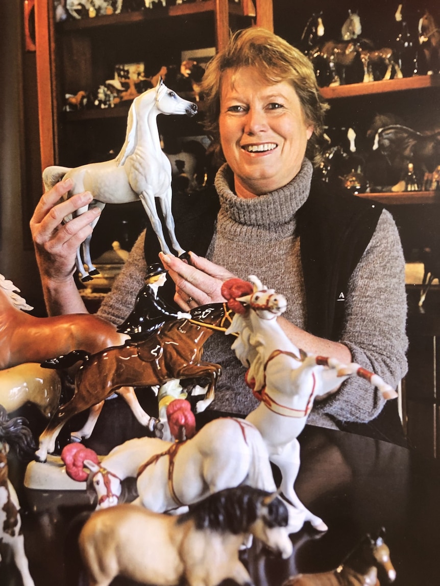 Kerren Hampton holding a model horse