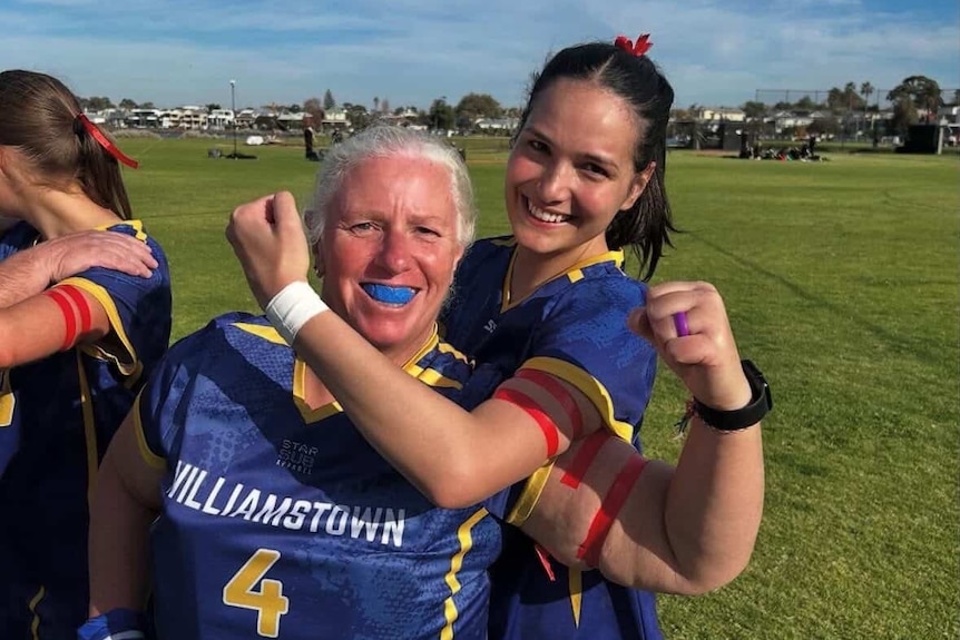 Williamstown women's footy players wearing red armbands in 2025.