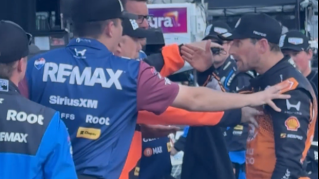 Romain Grosjean confronts Marcus Armstrong.