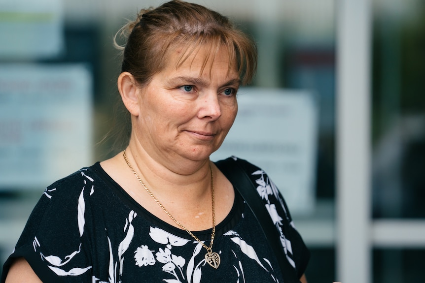 Michelle Hanson walks out of a Perth court.
