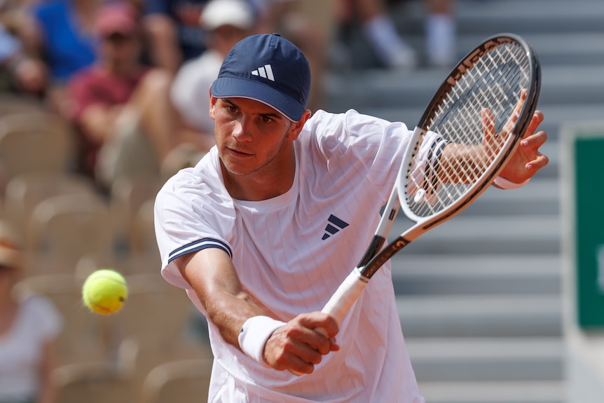 Rafael Jodar plays a one-handed backhand