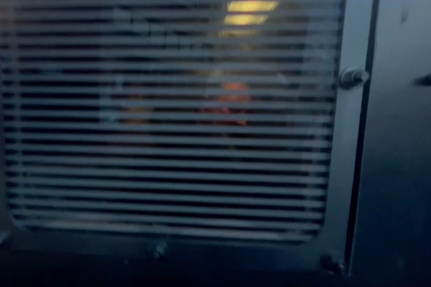 A man in custody outside an SA court.