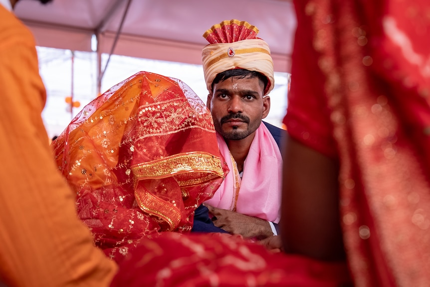 Two people getting married.
