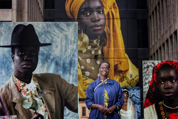 Atong Atem with her work at ‘PHOTO 2022’.