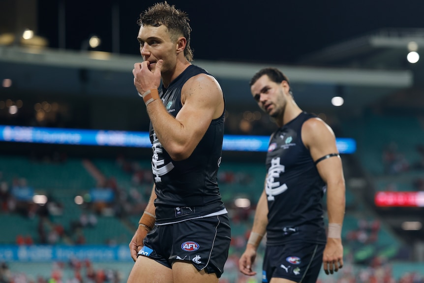 Patrick Cripps looks dejected after the Blues lost to Swans in 2026 AFL opening round.