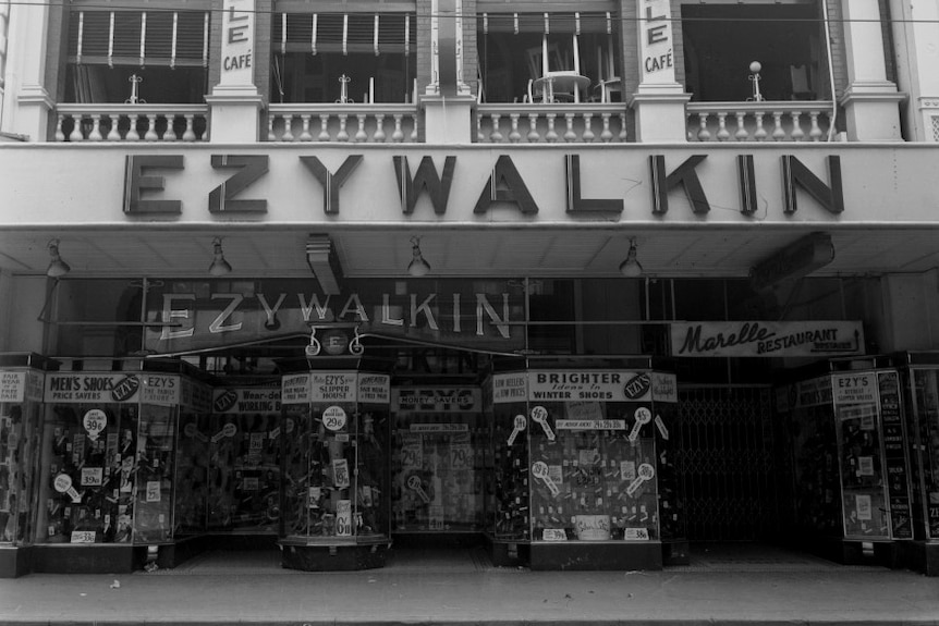 Black and white photo of a shop called Ezywalkin