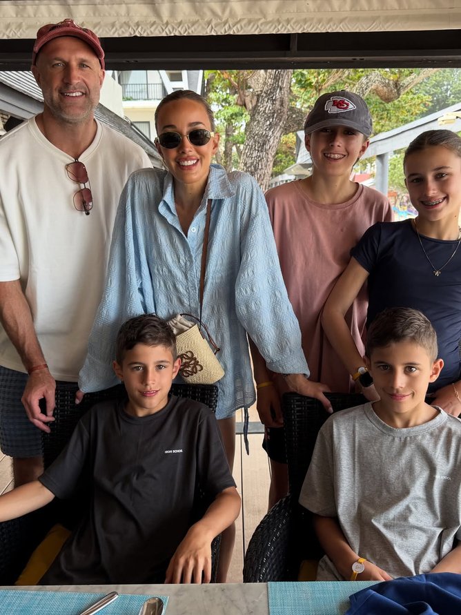 Bec Judd on holiday with her family, including Oscar, Billie, and twins Tom and Darcy.