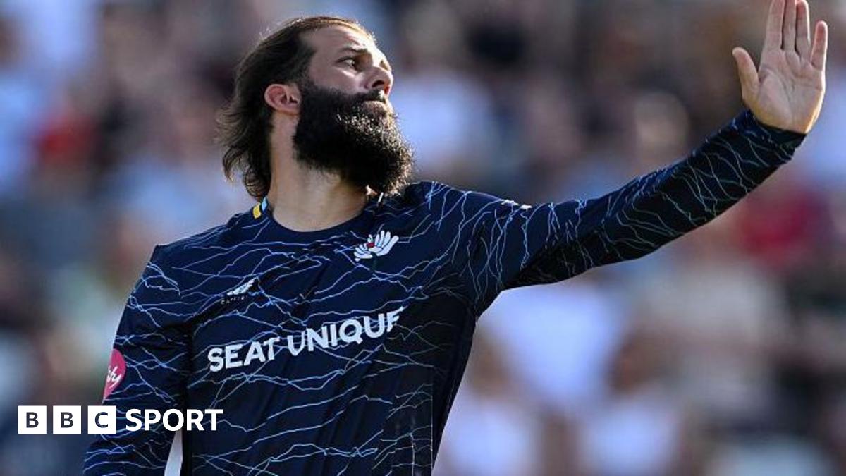 Moeen Ali, in his delivery stride, about to bowl for Yorkshire against Nottinghamshire