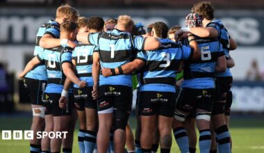 Cardiff players in a huddle