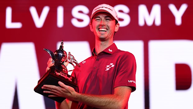 Elvis Smylie of Ripper GC poses for a photo with the trophy after winning the final round.