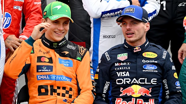 Oscar Piastri of Australia and McLaren and Max Verstappen of the Netherlands and Oracle Red Bull Racing talk on the drivers parade prior to the F1 Grand Prix of Australia at Albert Park Grand Prix Circuit on March 08, 2026 in Melbourne, Australia. (Photo by Mark Sutton - Formula 1/Formula 1 via Getty Images)