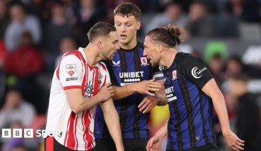 Taylor Harwood-Bellis and Luke Ayling clash during the play-off match at St Mary's