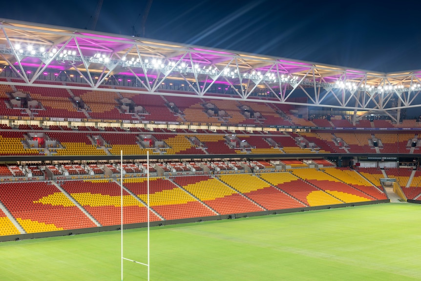 Photo of the stands and field at Suncorp Stadium at night.