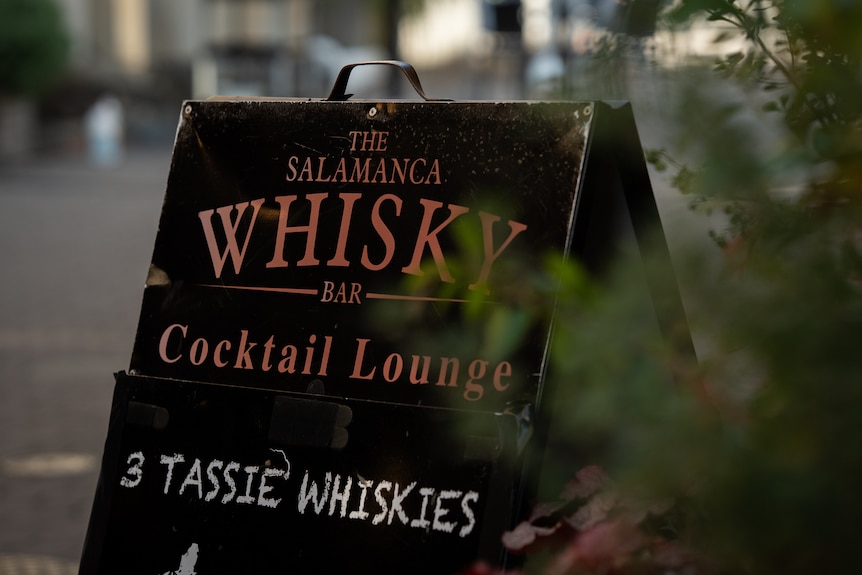A board with The Salamanca Whisky Bar written on it