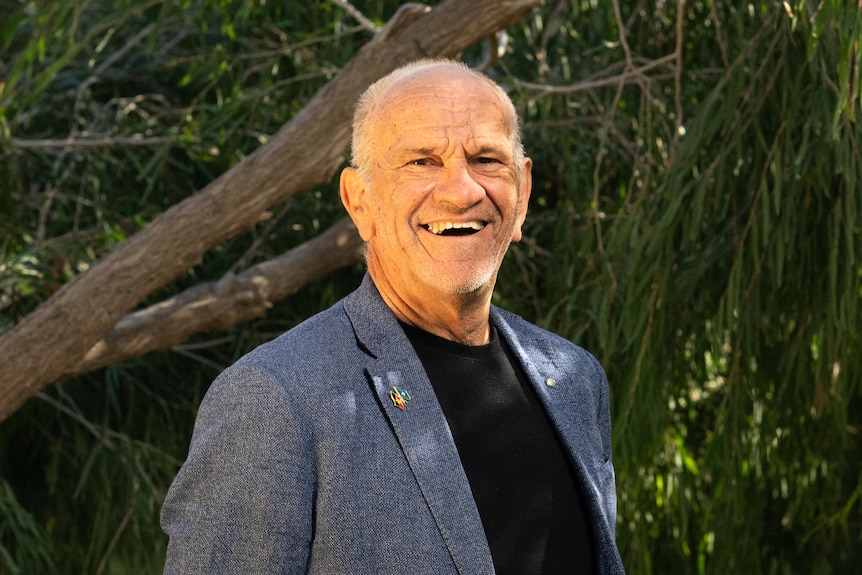 A man smiling at the camera.