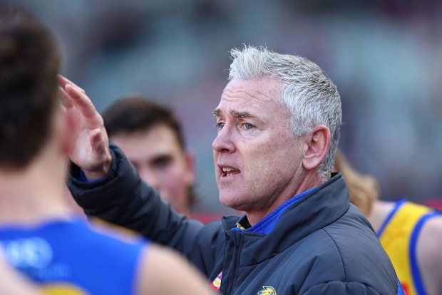 Adam Simpson, former senior coach of the Eagles talks to his players.