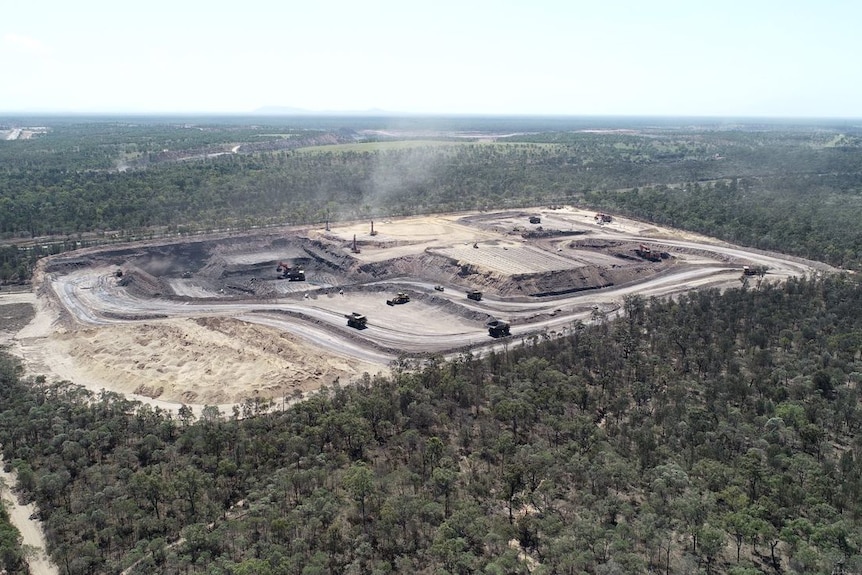 Image of a coal mine from above with what appears to be activity.