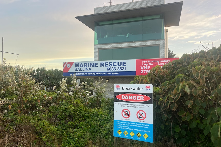 Exterior shot of Ballina Marine Rescue Building with warning/danger sigh in foreground