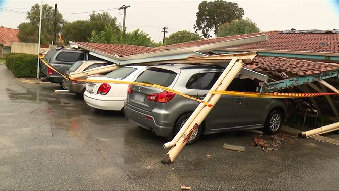 A carport has damaged cars in Girrawheen.