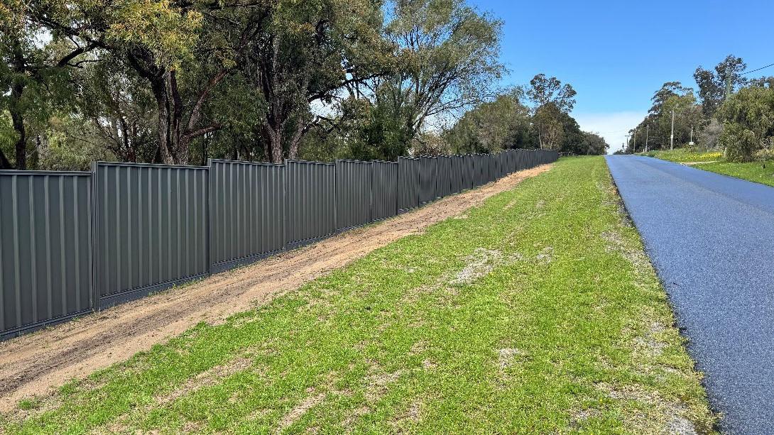 Owner of controversial 200m Colorbond fence in Cockburn will enter legal battle with council to keep it