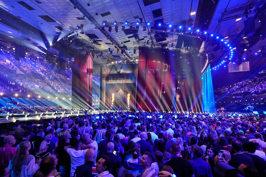 A view of the stage, from which a catwalk extends out of frame
