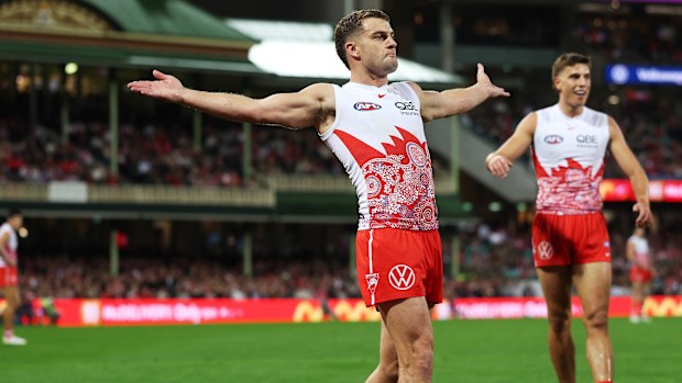 Tom Papley of the Swans celebrates kicking a goal.
