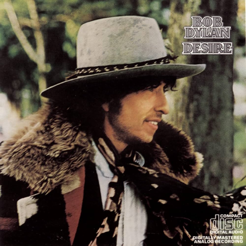 Album cover featuring a bearded man wearing a hat