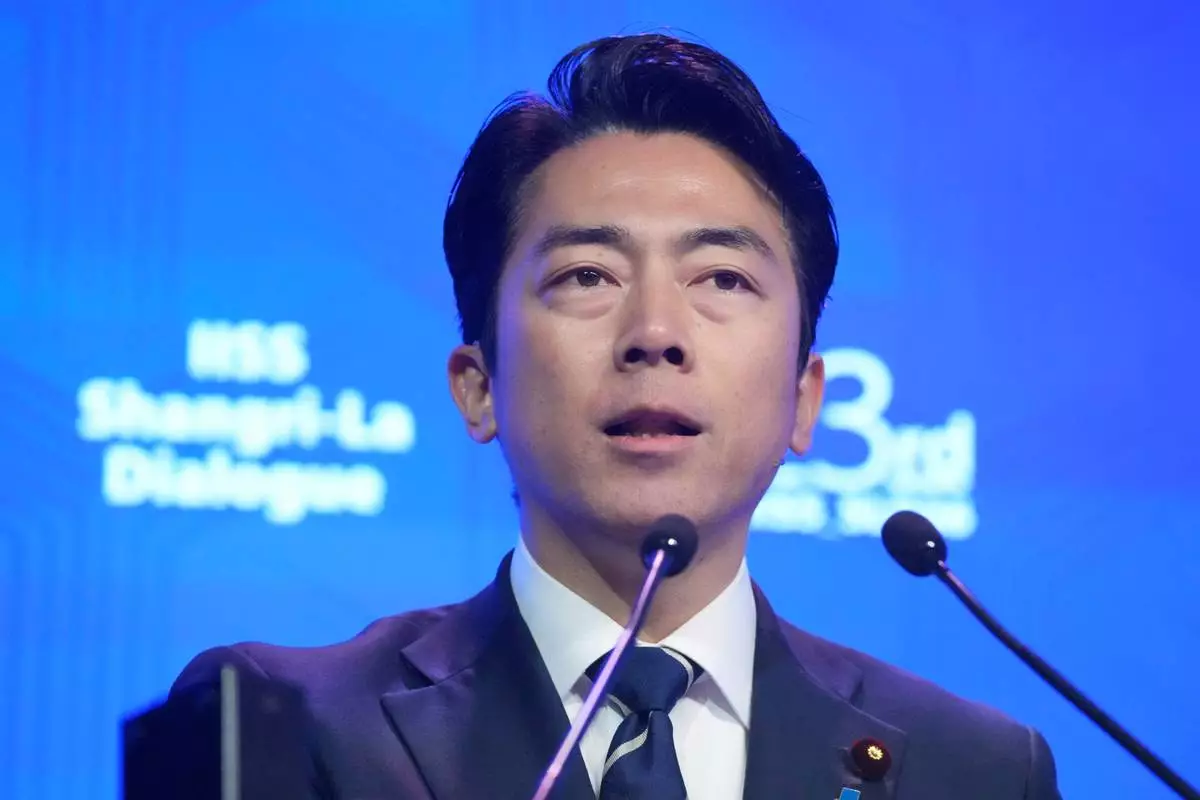 Japan's Defense Minister Shinjiro Koizumi delivers a speech during the Shangri-La Dialogue, Asia's annual defense and security forum, in Singapore, Sunday, May 31, 2026. (AP Photo/Achmad Ibrahim)