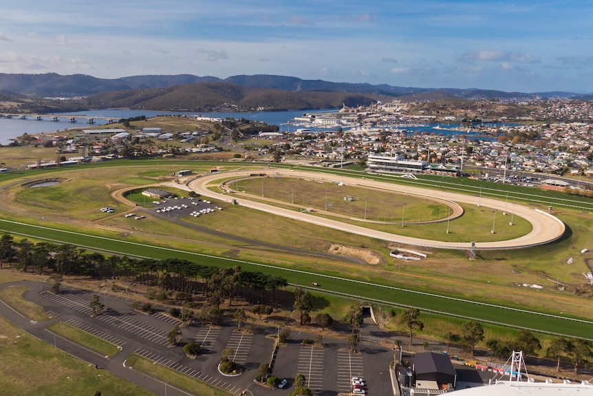 Aerial photographs of a horse racing track.