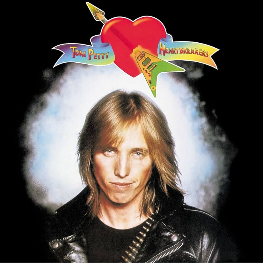 Album cover featuring a long haired man looking at the camera