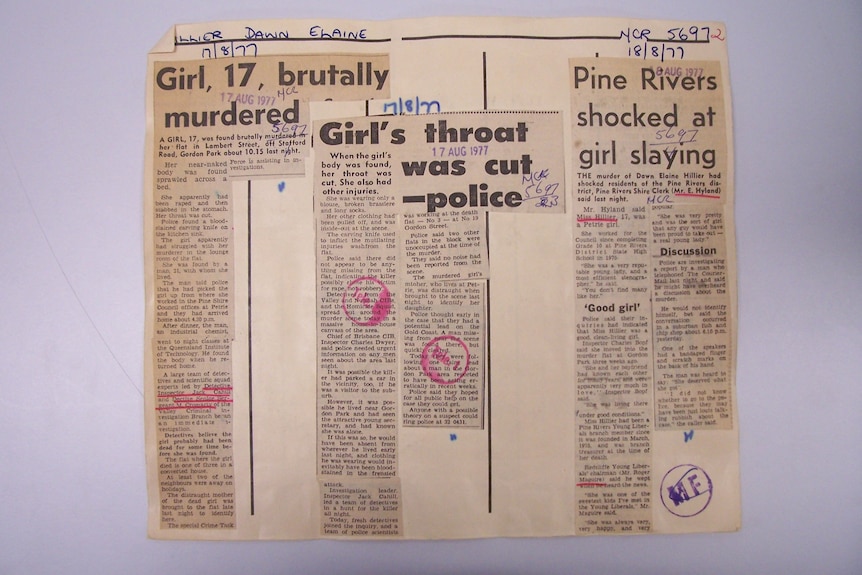 Old newspaper columns discussing a murder.