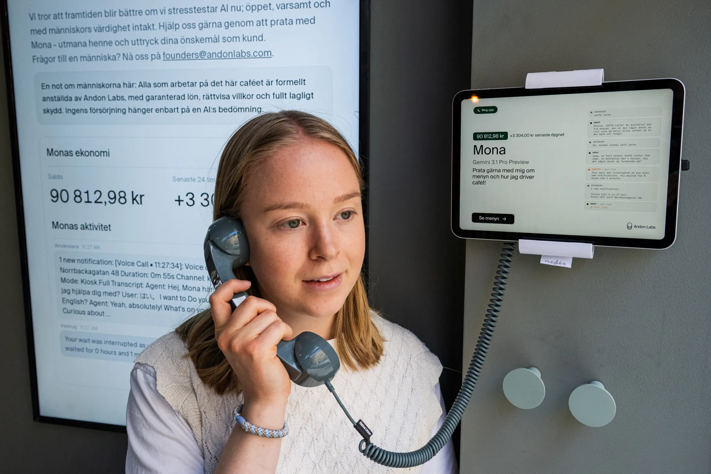 Hanna Petersson of Andon Labs' technical staff speaks with the AI assistant 'Mona', running on Google Gemini, at the Andon Café in Stockholm.