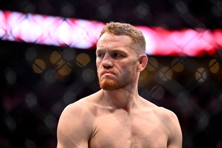 MONTREAL, QUEBEC - MAY 10: Jack Della Maddalena of Australia reacts as he enters the octagon prior to a welterweight title bout against Belal Muhammad of the United States during UFC 315 at Bell Centre on May 10, 2025 in Montreal, Quebec. Minas Panagiotakis/Getty Images/AFP (Photo by Minas Panagiotakis / GETTY IMAGES NORTH AMERICA / Getty Images via AFP)