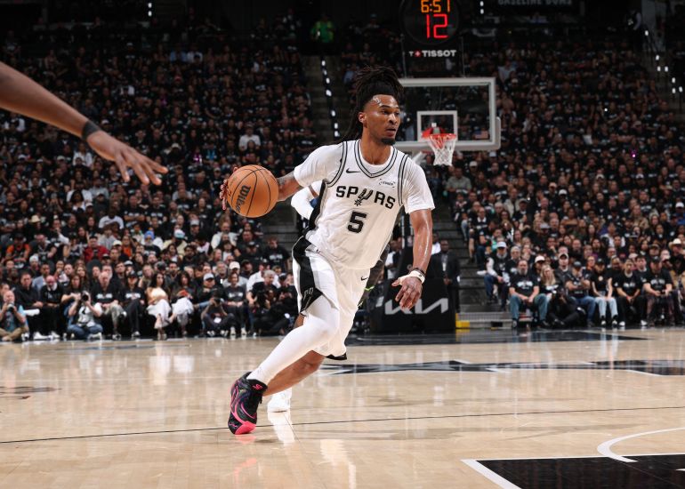 SAN ANTONIO, TX - MAY 6: Stephon Castle #5 of the San Antonio Spurs drives to the basket during the game against the Minnesota Timberwolves during Round Two Game Two of the 2026 NBA Playoffs on May 6, 2026 at the Frost Bank Center in San Antonio, Texas. NOTE TO USER: User expressly acknowledges and agrees that, by downloading and or using this photograph, user is consenting to the terms and conditions of the Getty Images License Agreement. Mandatory Copyright Notice: Copyright 2026 NBAE Joe Murphy/NBAE via Getty Images/AFP (Photo by JOE MURPHY / NBAE / Getty Images / Getty Images via AFP)