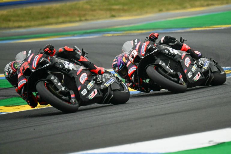 Marco Bezzecchi and Jorge Martin in action.