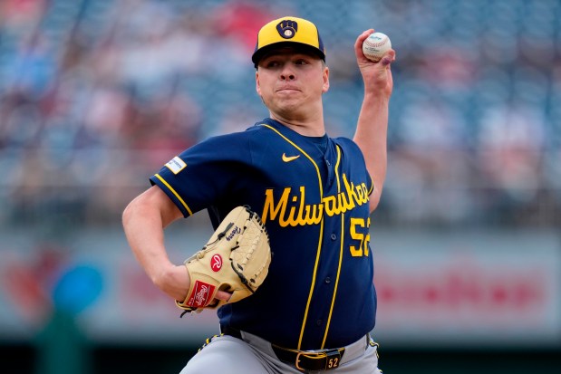 Milwaukee Brewers starting pitcher Kyle Harrison throws to the Washington Nationals during the first inning of a baseball game, Saturday, May 2, 2026, in Washington. (AP Photo/Jess Rapfogel)