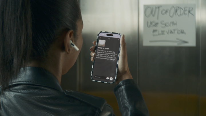 Apple's Live Recognition feature explaining what the camera is facing to a low-vision person.