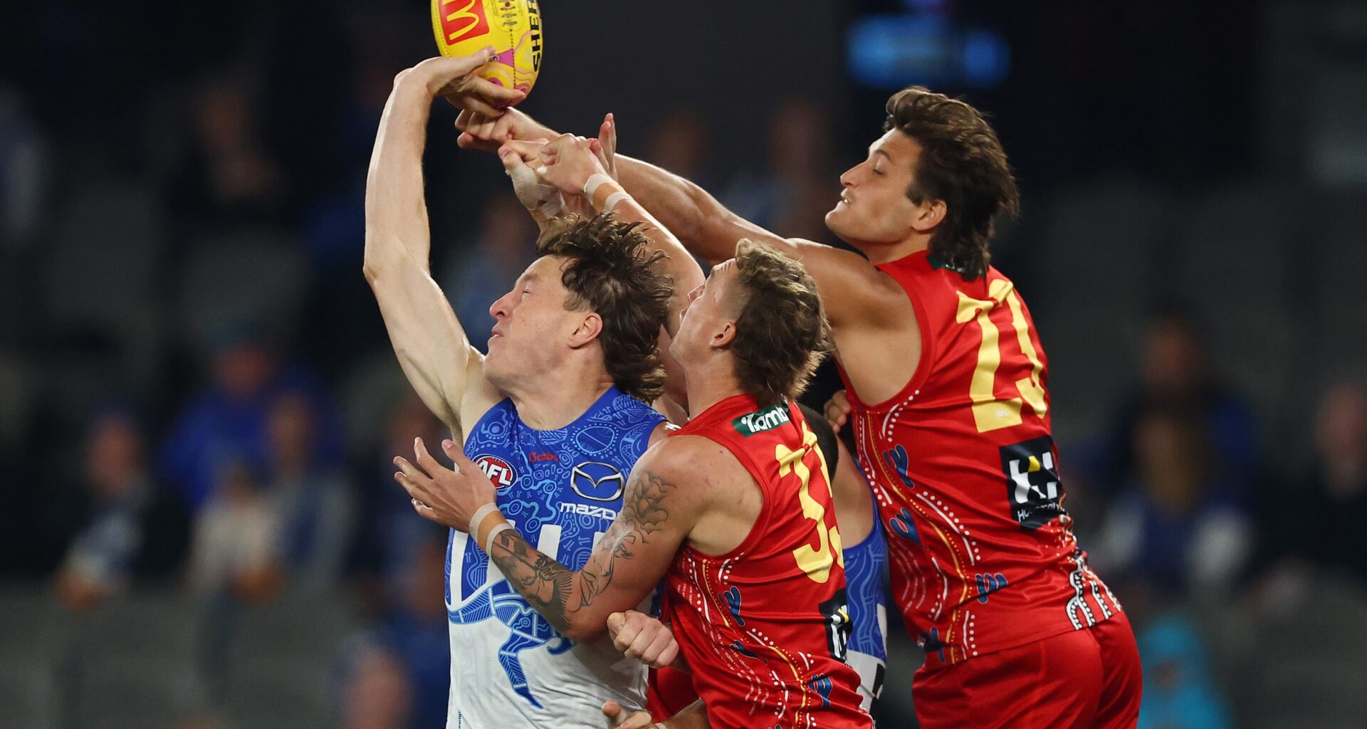 Final teams in as Roos look to bounce back against Suns. LIVE from 1.15pm AEST